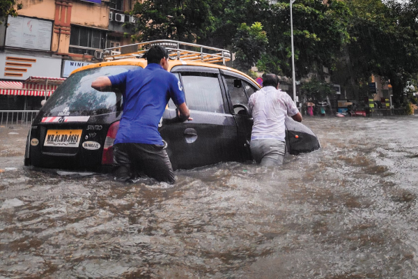 Men Pushing Car in Flood