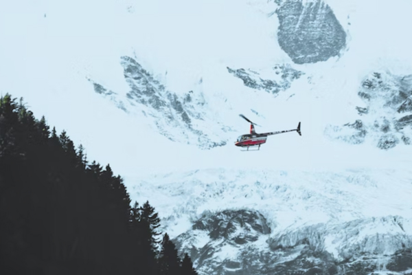 Helicopter In Mountains